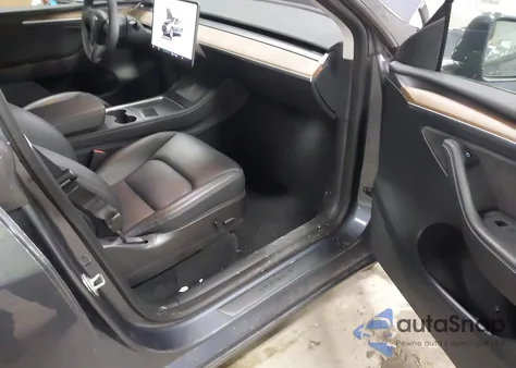 2023 Tesla Model Y from USA, damaged, VIN 7SAYGAEE3PF690592